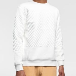 white quilted sweatshirt